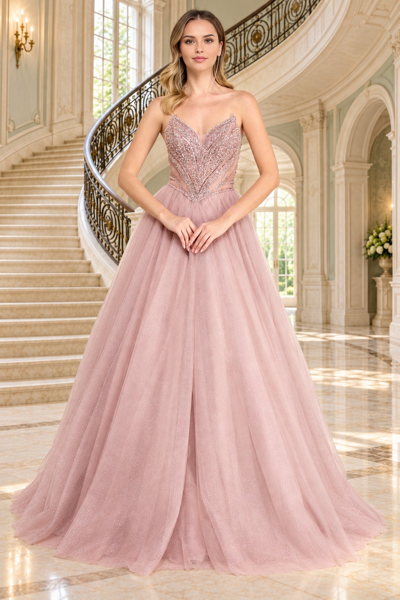 Amelia Couture JQ1104 is a blush-colored strapless prom ball gown featuring a beaded corset bodice and a full, glitter tulle skirt.